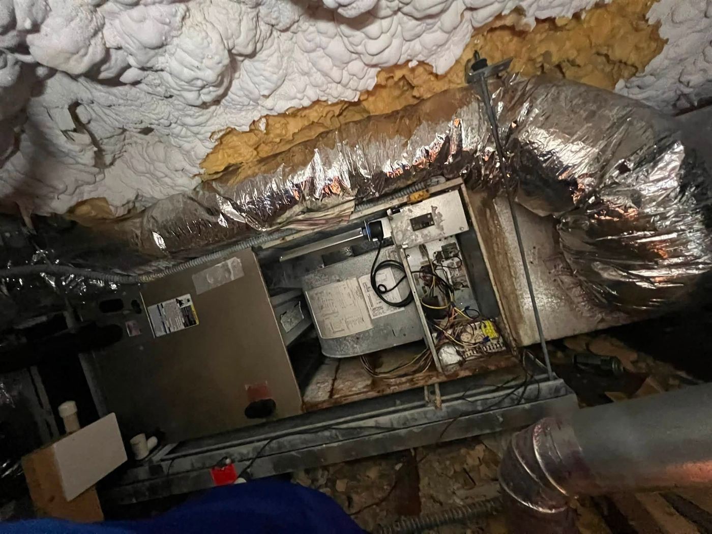 Air handler and insulated ductwork in an attic