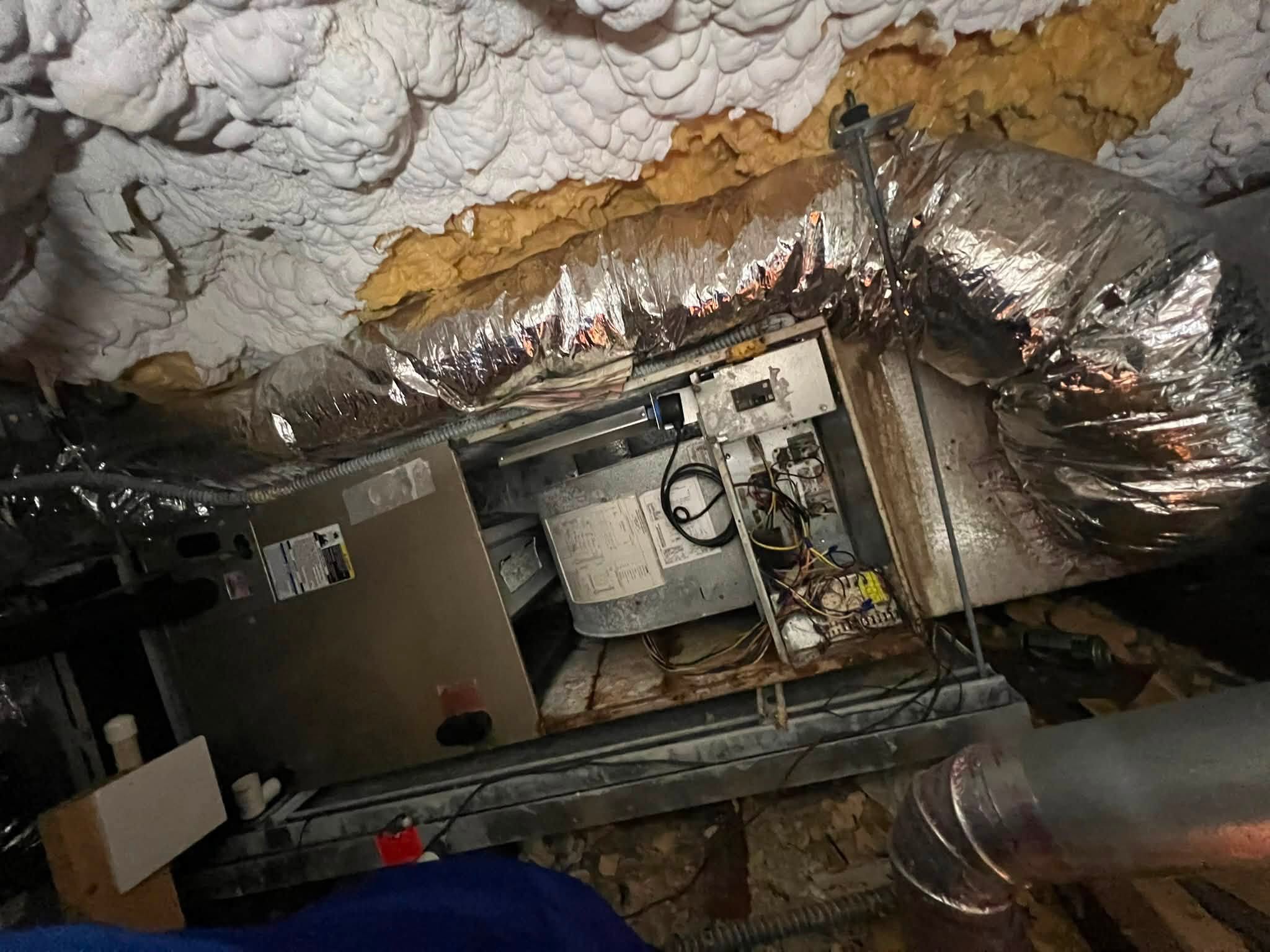 Mama's Boy Air Conditioning technician on an AC repair job in Boca Raton, FL
